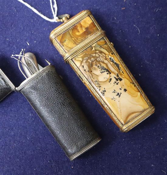 Two 18th century Etuis, one brass and hardstone, the other leather mounted